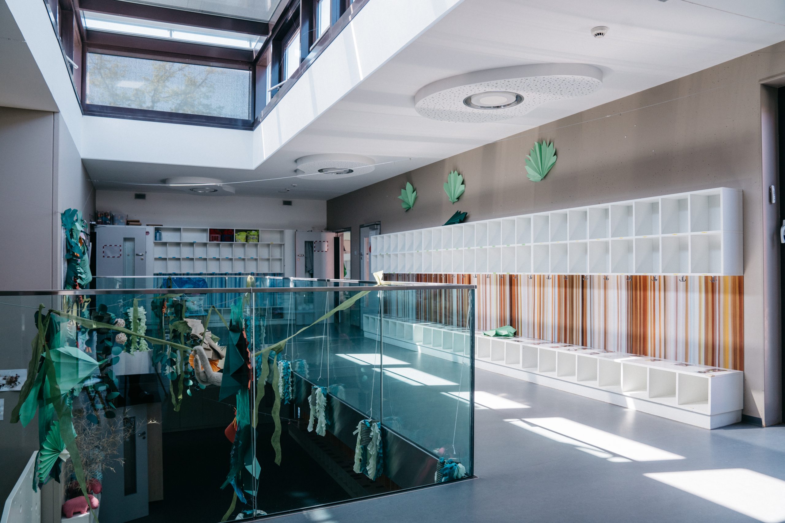 Bright indoor childcare environment at L’Île aux Mômes Vésenaz daycare centre with dedicated activity spaces.